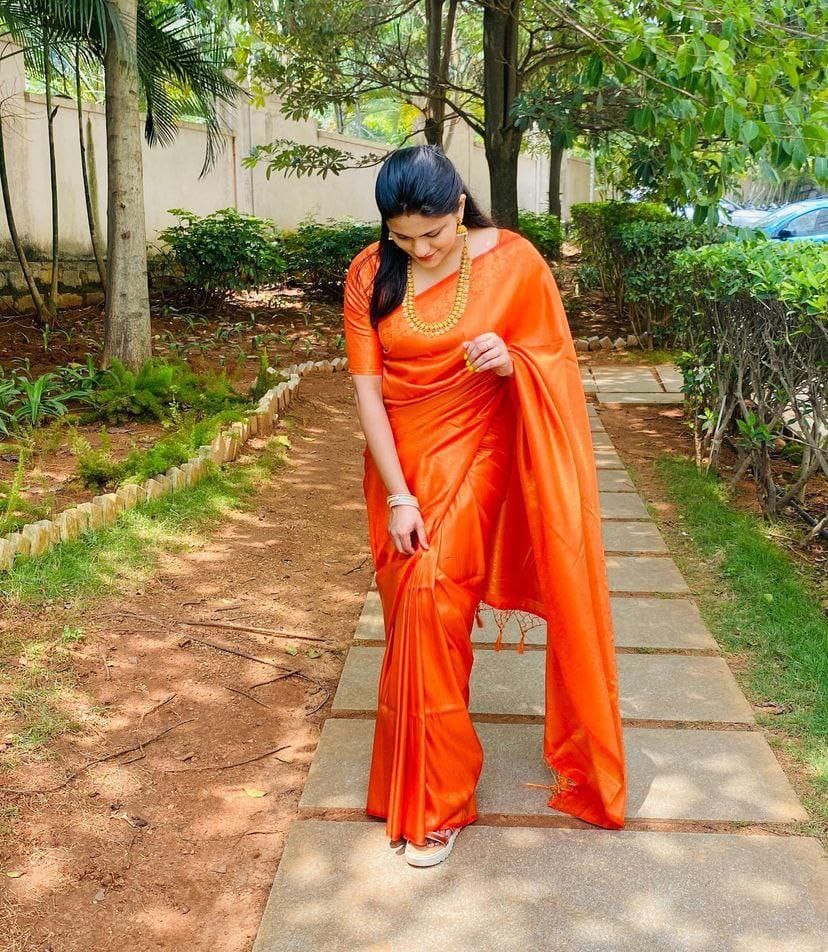 Vibrant Orange Soft Silk Saree with Elegant Minimal Finish