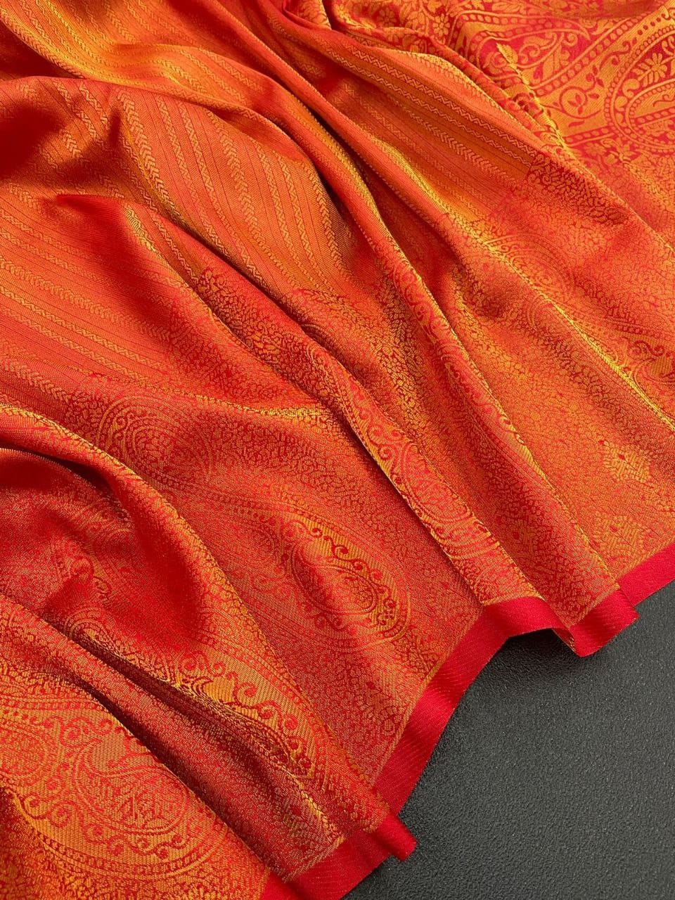 Vibrant Orange Soft Silk Saree with Elegant Minimal Finish